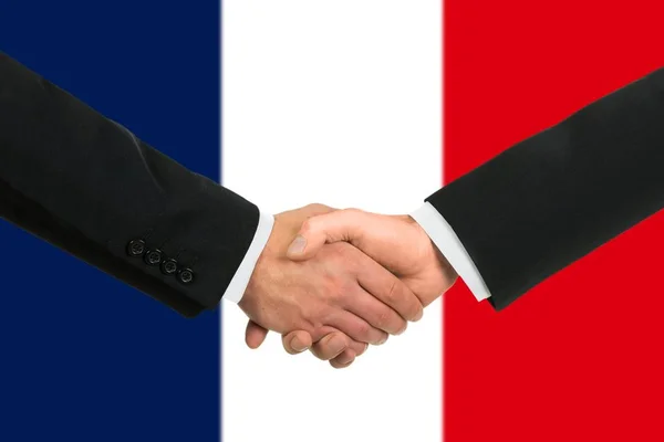 Den Franska Flaggan Och Företags Handskakning — Stockfoto