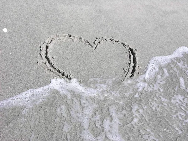 Heart Shape Beach Being Washed Out Ocean Surf — Stock Photo, Image