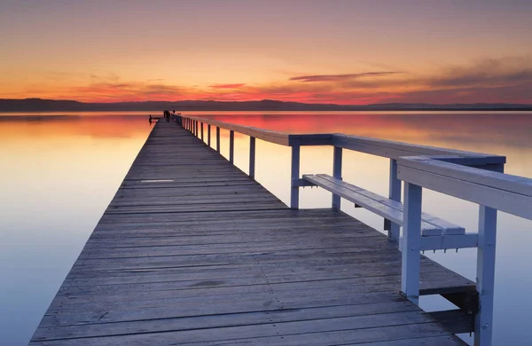 Sunset Long Jetty Fiery Red Clouds Reflections Tuggerah Lake Central — Stock Photo, Image