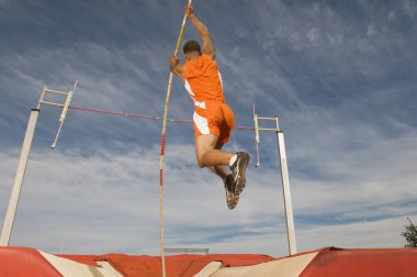 Male Athlete Pole Vaulting clipart