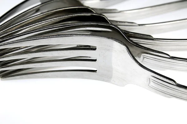 Sølv Metal Gafler Liggende Det Hvide Køkkenbord - Stock-foto