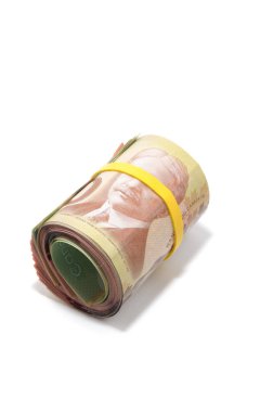 Roll of Canadian banknotes with 100 dollars at the surface clipart