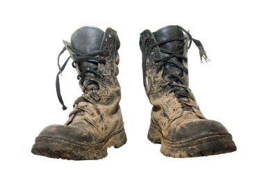 A pait of dirty hiking boots isolated over white clipart