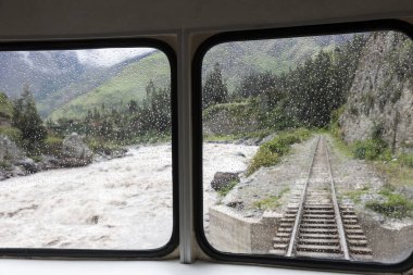 Train to Aquas Calientes in Peru - the village by Machu Picchu clipart
