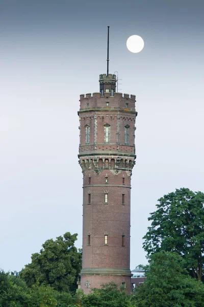 Brick Watertower Building Full Moon Trees — Stock Photo, Image