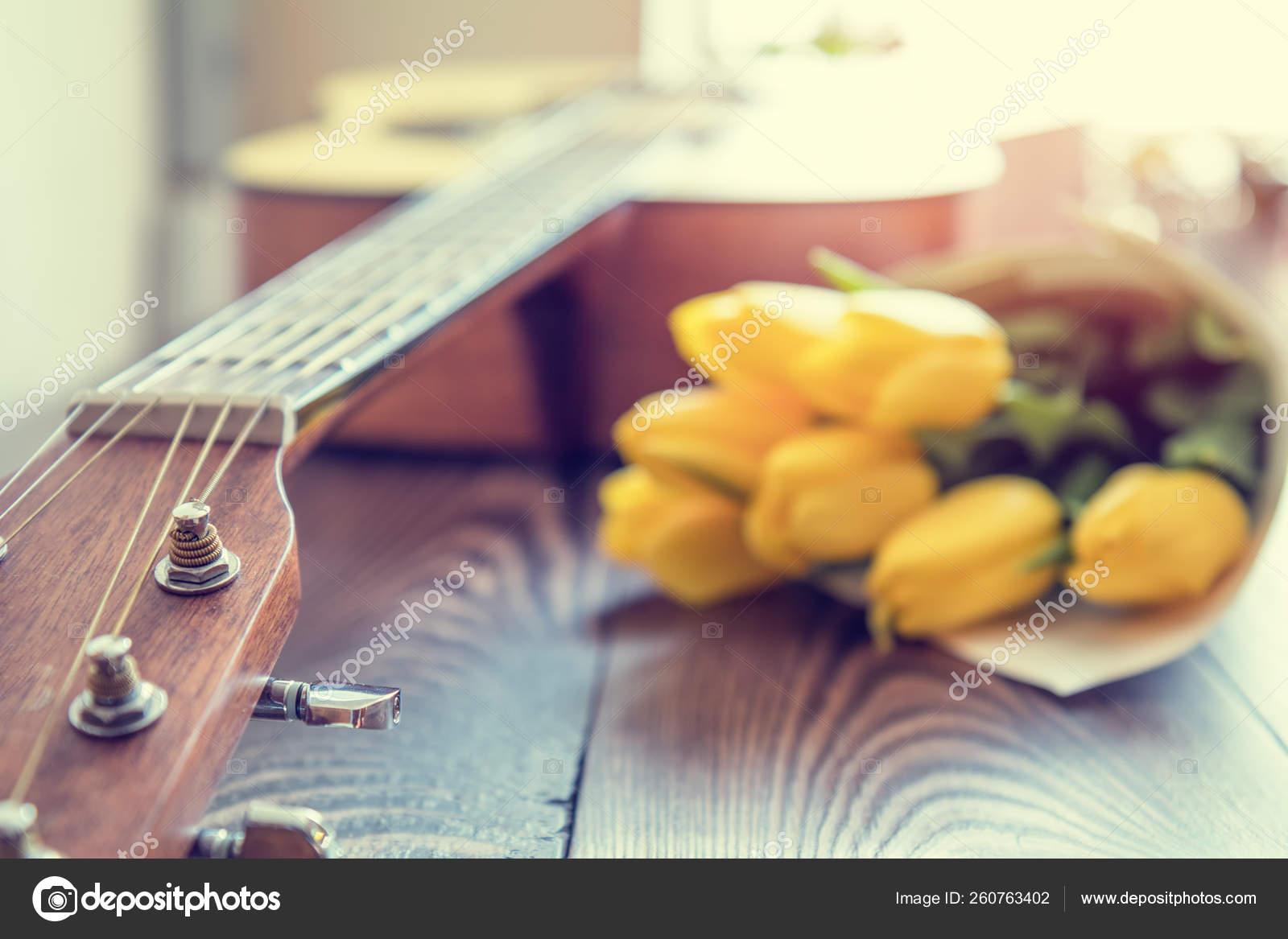 Beautiful Spring Background Music Guitar Yellow Tulips Musical Page Dark  Stock Photo by ©YAYImages 260763402