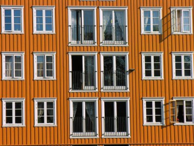 Orange/brown Window pilework over a canal clipart