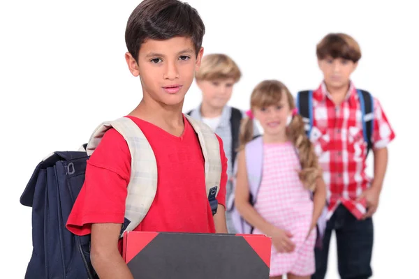 Cuatro Jóvenes Escolares Aislados Sobre Fondo Blanco — Foto de Stock