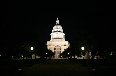 A nice clean shot of the Texas State Capitol Building in downtown Austin, Texas at night. clipart
