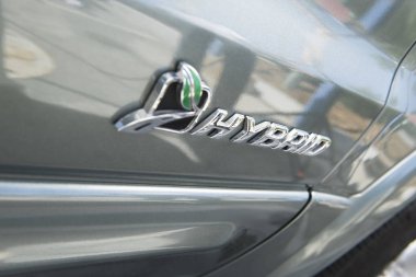 Close up of sing on hybrid car clipart
