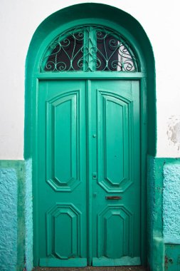 Traditional light green, vintage, wooden, retro door. clipart