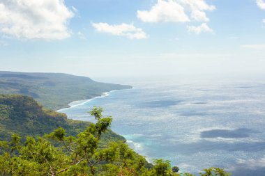 clear blue water surronds the south pacific island of East-Timor, also known as Timor-Leste clipart