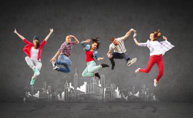 summer, sport, dancing and teenage lifestyle concept - group of teenagers jumping with city drawing in the back clipart
