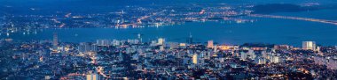 George Town Penang Malaysia Aerial Scenic view from Penang Hill during Evening Blue Hour Panorama clipart