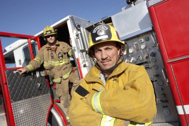 Portrait Of A Confident Firefighter clipart