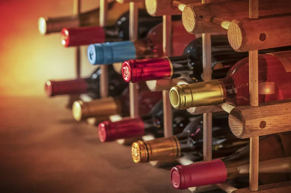 Wine Bottles Stacked Wooden Racks Shot Limited Depth Field — Stock Photo, Image