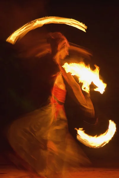 fire-show, woman in action with fire