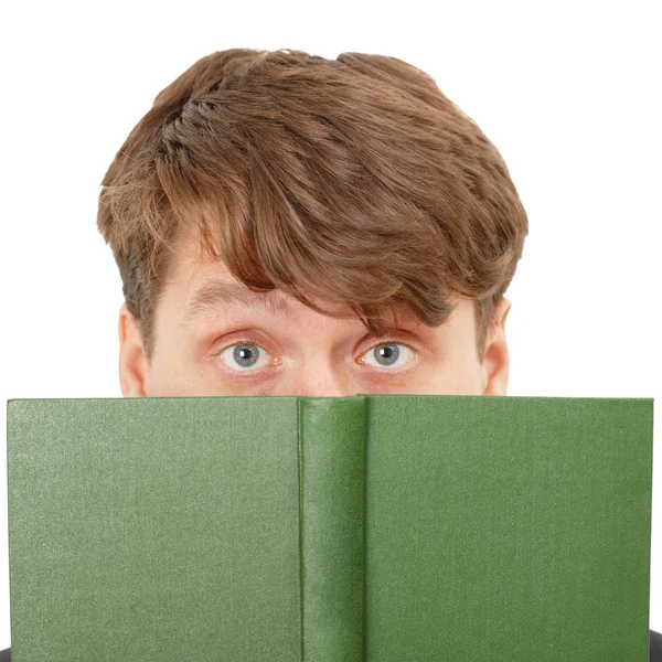 Jovem Escondeu Seu Rosto Atrás Livro Verde Close Fundo Branco — Fotografia de Stock