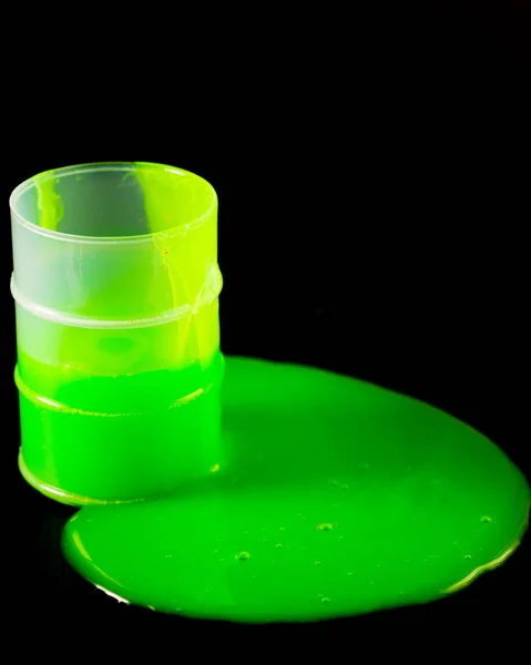 Green Slime Spllling Out Barrel Black Background — Stock Photo, Image