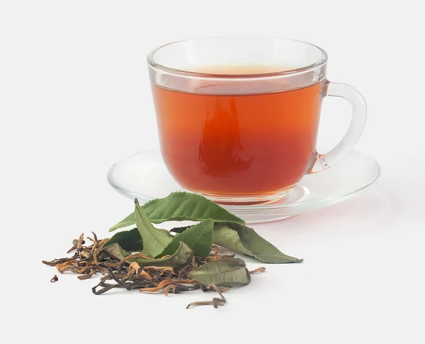 Прозрачная Чашка Чая Свежими Сушеными Чайными Листьями Сером — стоковое фото