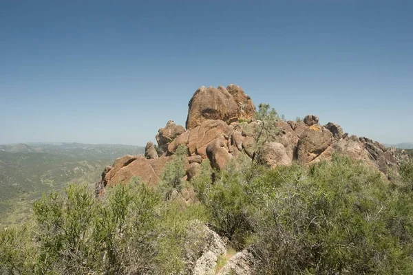Pinnacles National Monument is a protected mountainous area located east of central California\'s Salinas Valley. The Monument\'s namesakes are the eroded leftovers of half of an extinct volcano.