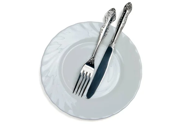 Messer Und Gabel Auf Einem Weißen Teller — Stockfoto