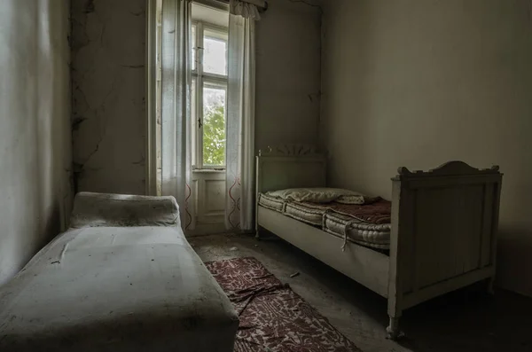 two old beds in abandoned house