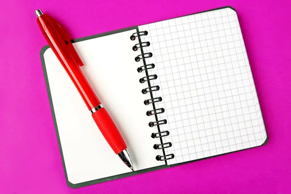 Opened Notebook Squared Pagewith Red Pen Purple Background — Stock Photo, Image