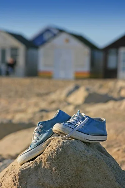 Pair Trainers Gym Beach Shoes Perched Top Some Rocks Beach — Stock Photo, Image