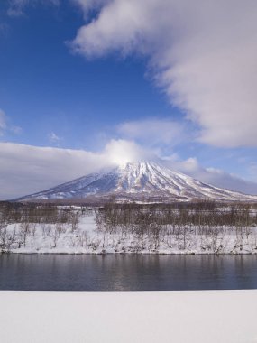 Mount Yotei, an active stratovolcano located in Shikotsu-Toya National Park, Hokkaido, Japan. It is one of the 100 famous mountains in Japan. clipart