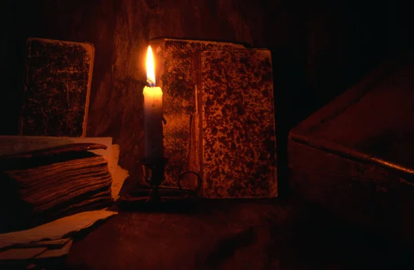 Old Books Box Candle Isolated Dark — Stock Photo, Image