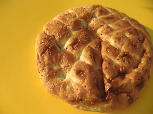 bakery product of oriental countries and southern Europe against yellow background