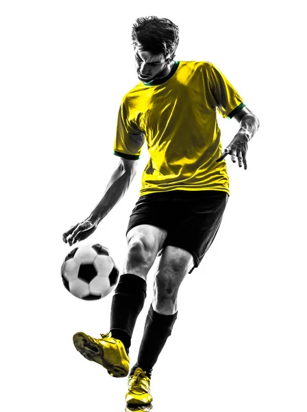 一名巴西足球足球球员年轻男子在白色背景上的侧面影像工作室 — 图库照片