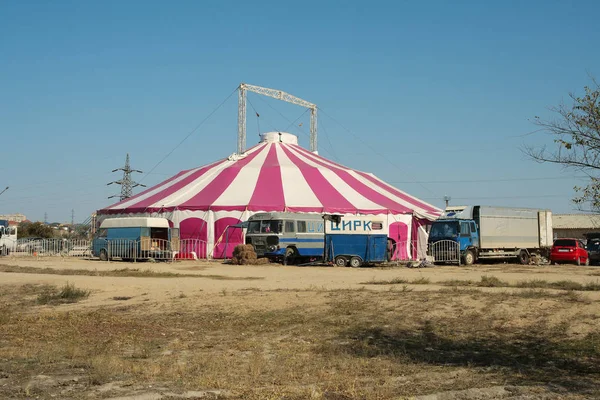 Traveling circus tent in a vacant lot located in the city of Aktau.