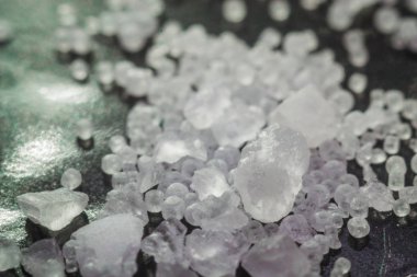 sea salt close-up super macro photos on a black background clipart