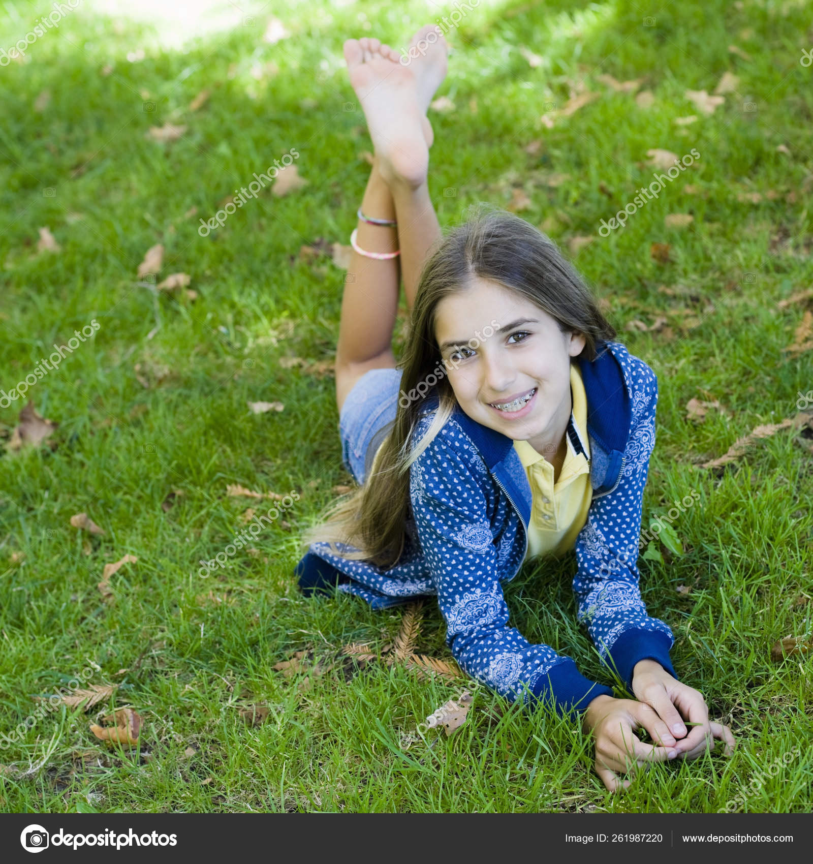 Portrait Smiling Tween Girl Lying Grass Smiling Camera Stock Photo by ...