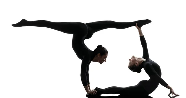 Dvě Ženský Soupeč Trénuje Gymnastický Jód Siluetě Bílém Pozadí — Stock fotografie