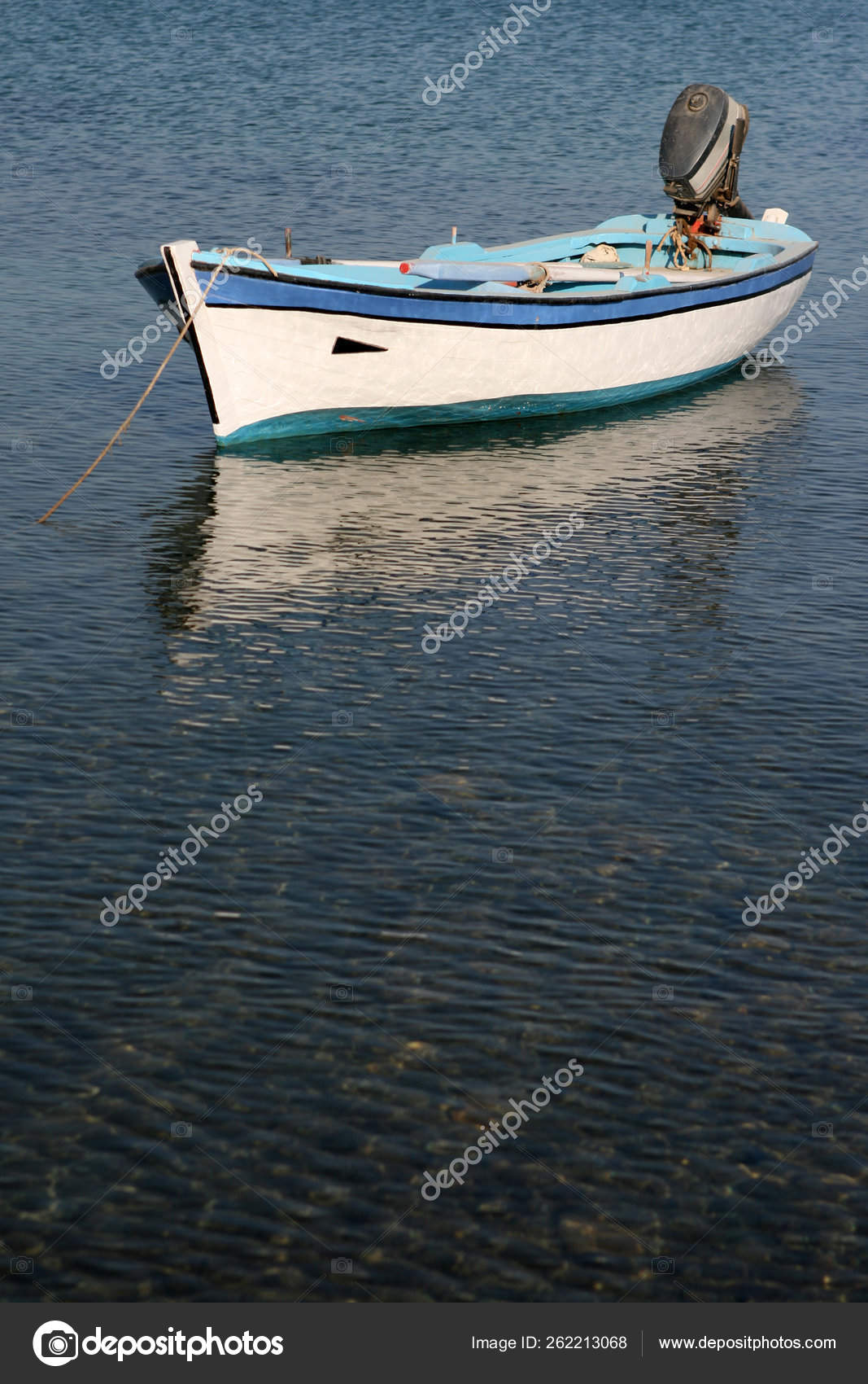 Traditional Greek Small Wooden Fishing Motor Boat — Stock Photo © YAYImages  #262213068