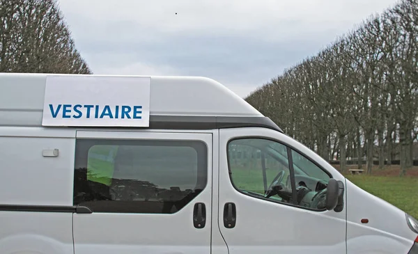 small van fitted out in cloakroom during a sportive event