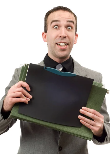 Молодий Бізнесмен Тримає Купу Файлів Ізольованих Білому Тлі — стокове фото