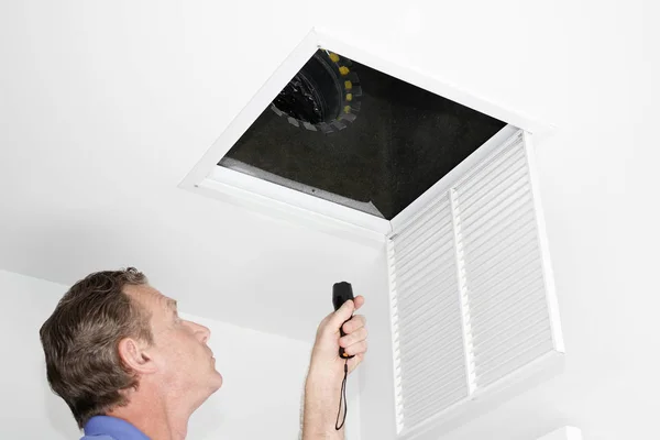 Male Looking Ceiling Air Intake Duct Flashlight Checking Maintenance Person — Stock Photo, Image