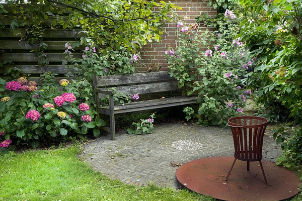 Country Style Garden Bench Fireplace Lots Flowers Summer — Stock Photo, Image