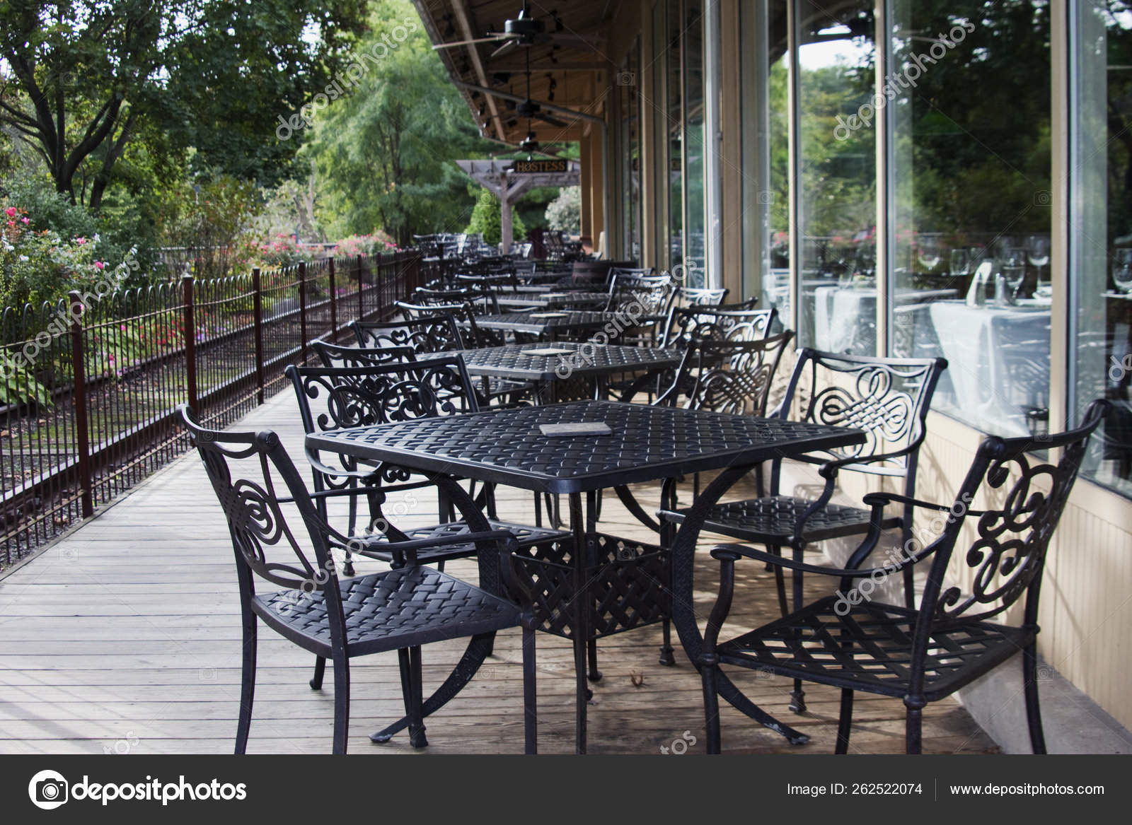 Black Wrought Iron Tables Chairs Beckon Visitors Enjoy Outdoor Dining
