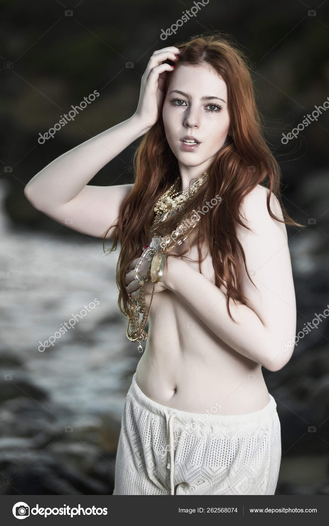 Semi Nude Woman Beautiful White Skin Long Red Hair Outdoors Stock Photo by ©YAYImages 262568074 photo