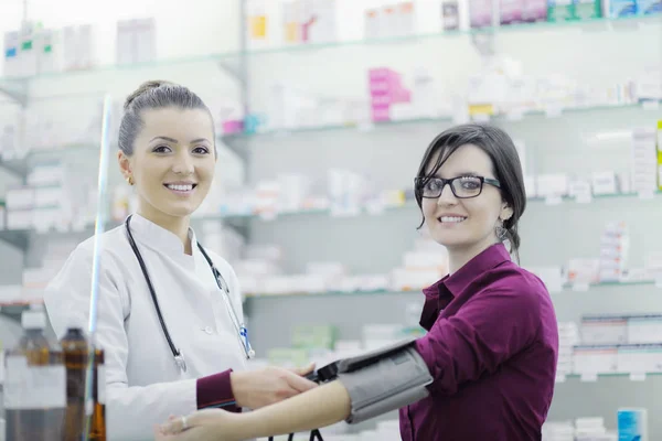 Doctor Checking Blood Pressure Heart Rate Hospital Pharmacy Young Female — Stock Photo, Image