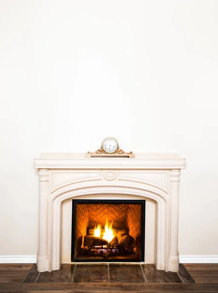 Luxurious White Marble Fireplace and empty wall for your text, logo, images, etc