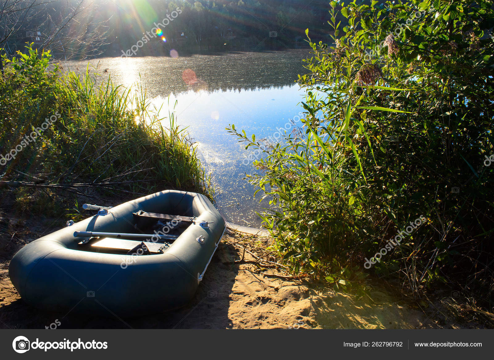 Empty Rubber Fishing Boat River Rays Dawn Stock Photo by ©YAYImages ...