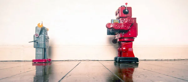 stick them up , robo cop puts robot undr arrest , on old wooden floor with reflection