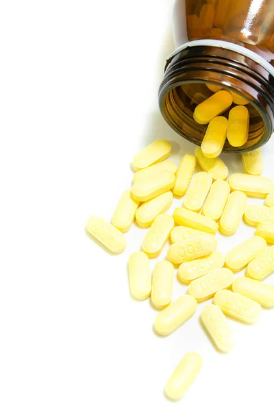 Κίτρινα Χάπια Λευκό Φόντο — Φωτογραφία Αρχείου