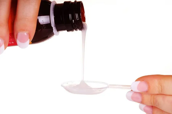 Liquid Medicine Pouring Female Hands Bottle Measuring Spoon White Background — Stock Photo, Image
